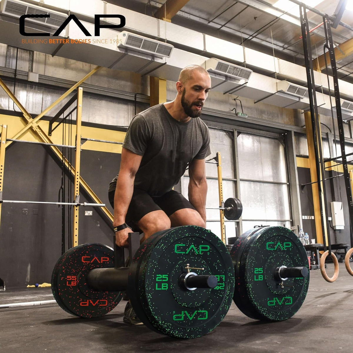 CAP 2-inch Olympic Bumper Plate Weight Set | 100-370 lbs | Multiple Colors | Storage Rack Optional